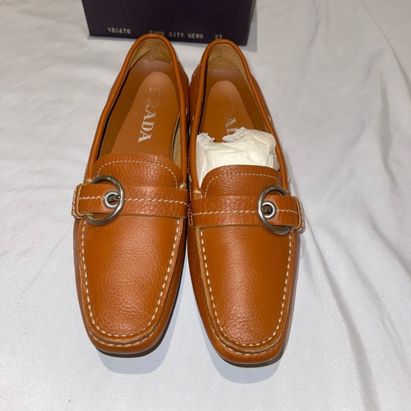 Vintage Prada loafer with rubber sole. Brown soft leather with buckle detailing - Picture 1 of 7